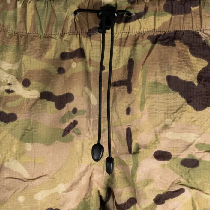 Detail view of elastic waistband and toggle drawcord on British MTP overtrousers