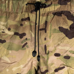 Detail view of elastic waistband and toggle drawcord on British MTP overtrousers