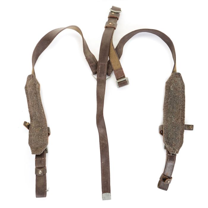 Reverse side of Soviet army web suspenders showing grey wool felt shoulder padding