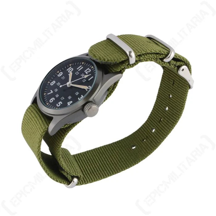 High angle view of the US Vietnam War service watch on olive green woven wristband