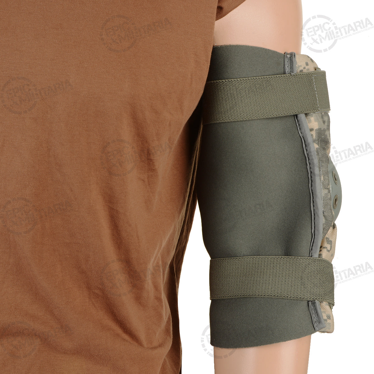 Side profile of ACU digital camo elbow pad secured on a mannequin arm with adjustable olive drab elastic straps and hook-and-loop closures.