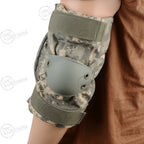 Close-up view of an ACU digital camo elbow pad with a hard green shell, demonstrating the secure fit on a mannequin arm for tactical gear.