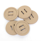 Detailed top-down view of durable khaki buttons, showcasing the classic British Army style and slotted construction for secure attachment.