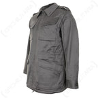 Angled view of the grey-green Danish M71 Civil Defence Parka showing side profile, sleeve detailing, and adjustable button cuffs.