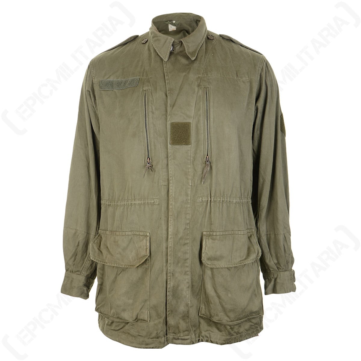 Original French M64 field jacket in olive drab with four front pockets, drawstring waist, and hook and loop patches for customisation.