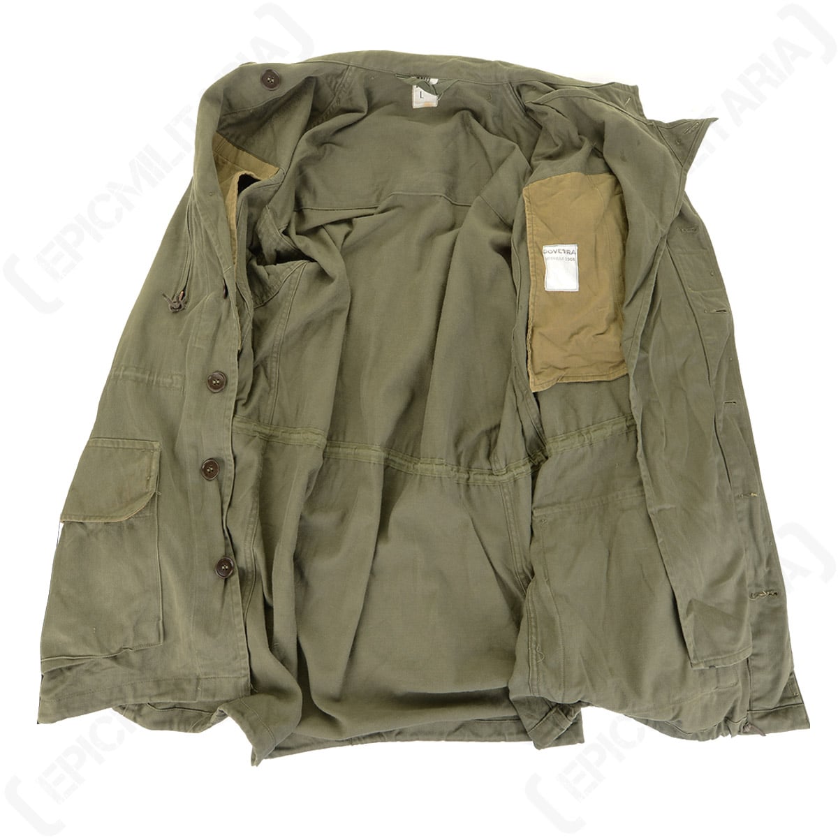 Interior view of the French army M64 field jacket, showing the breathable lining, button closure system, and genuine surplus manufacturer label.