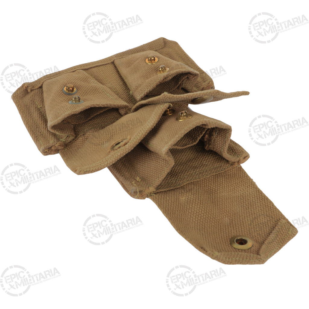 Khaki canvas ammo pouch shown partially open, highlighting the interior construction and secure brass stud fastenings.