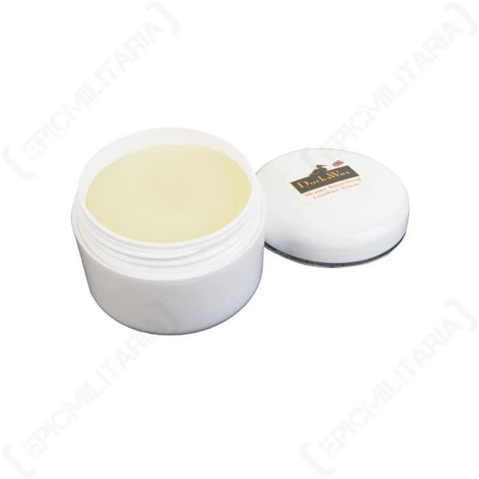 Open tub of DucksWax translucent leather conditioning wax showing cream texture