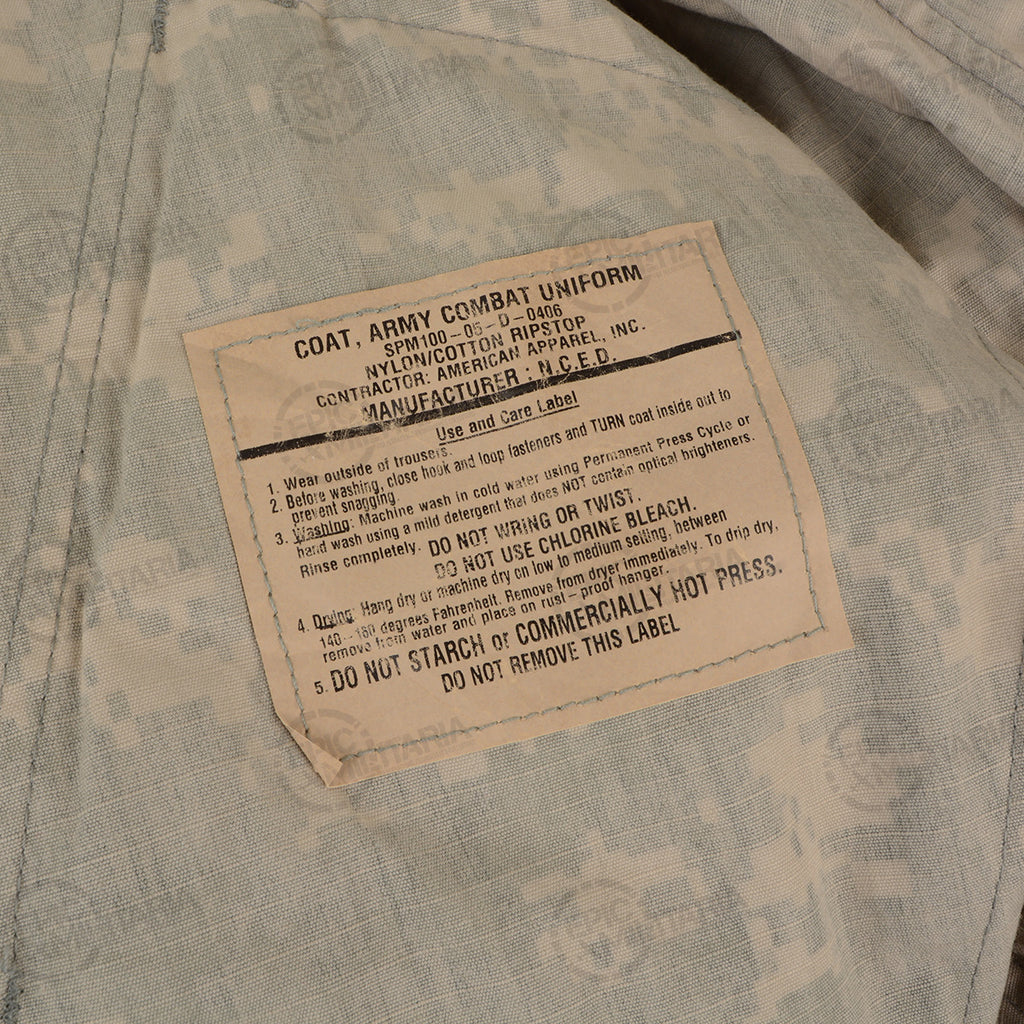 Close-up of a specific Army Combat Uniform care label detailing washing and maintenance instructions for nylon cotton ripstop.