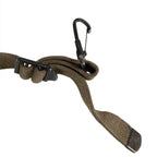 Close-up of the blackened steel wire snap hook on the strap of US Army M44 suspenders.