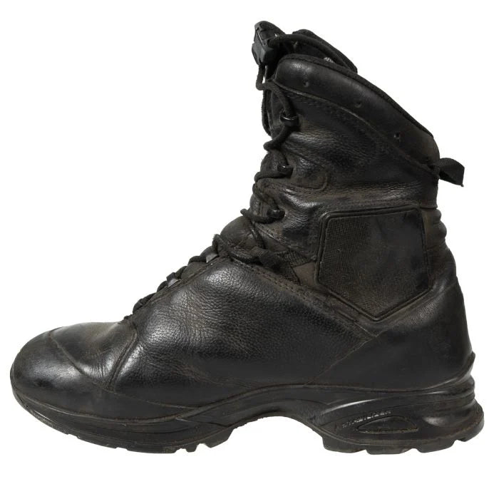 Medial side view of the Haix combat hiking boot showing the smooth full-grain black leather uppers and robust polyurethane midsole.