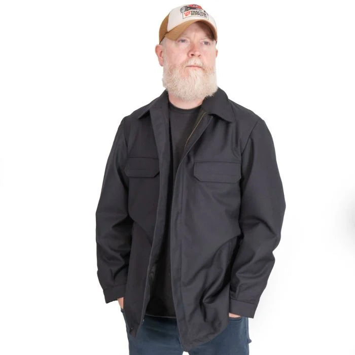 Internal lining and adjustable drawcord hem detail of dark blue German military fire brigade jacket