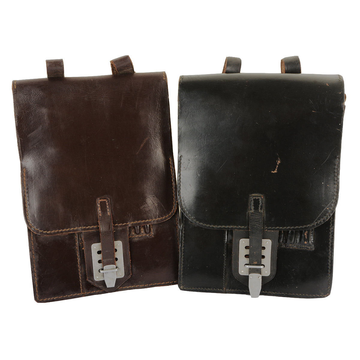 Two original Austrian Army leather map cases in black and brown, featuring metal tuck-lock buckles.