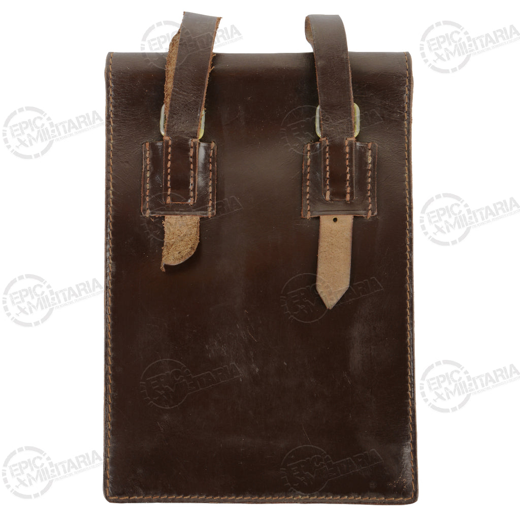 Rear view of a brown Austrian Army leather map case with two leather belt loops for secure attachment.