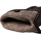 Close-up view of the interior of a Dutch Army leather glove, revealing the insulating wool lining for warmth.