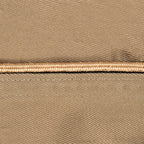 Close-up of tan piping detail on an authentic WW2 era US Army Garrison Cap, highlighting the durable cotton weave.