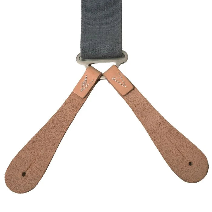 Detail of the rear dual tan leather button tabs on the Y-back military suspenders