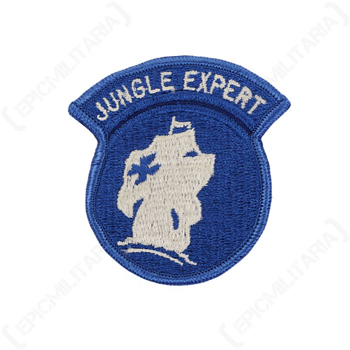 Front view of original US Army Jungle Expert embroidered patch featuring white galleon ship on blue background