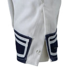Close-up of the navy blue sleeve cuff with three white stripes and button closure on the German Navy sailor shirt