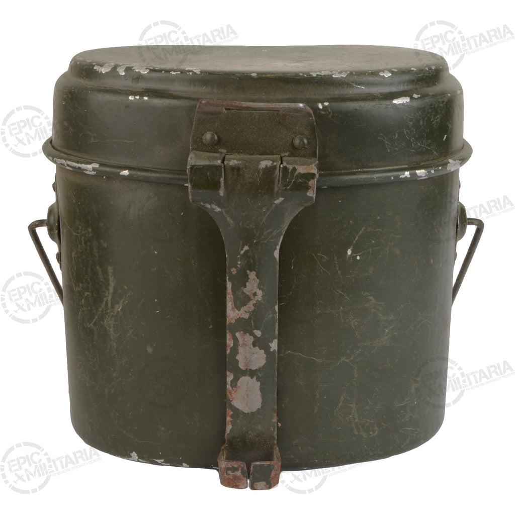 Front profile of an authentic Romanian Army mess tin with its characteristic metal latch and chipped paint finish.