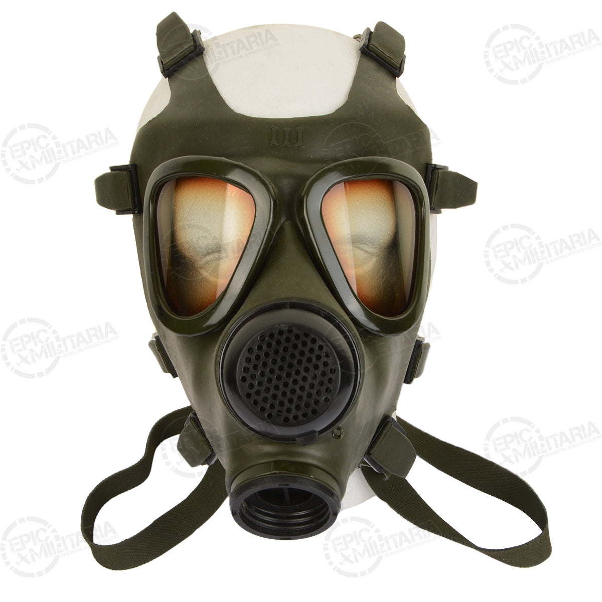 Front-facing view of the Romanian M74 military gas mask, highlighting the circular exhale valve and STANAG 4155 filter inlet.