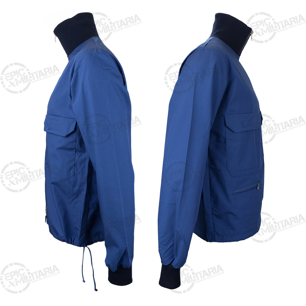 Profile view of the blue Swedish military sports jacket highlighting the dark ribbed collar and adjustable hem cord.