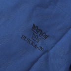 Detailed shot of the internal fabric stamp featuring the Three Crowns of Sweden and RUKKA-79 branding.