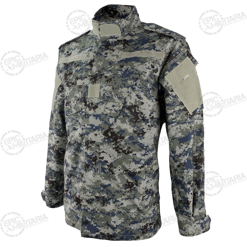 Three-quarter angle of an authentic Iraqi Police blue digital camo shirt featuring durable polycotton ripstop construction and US Army Combat Uniform cut.