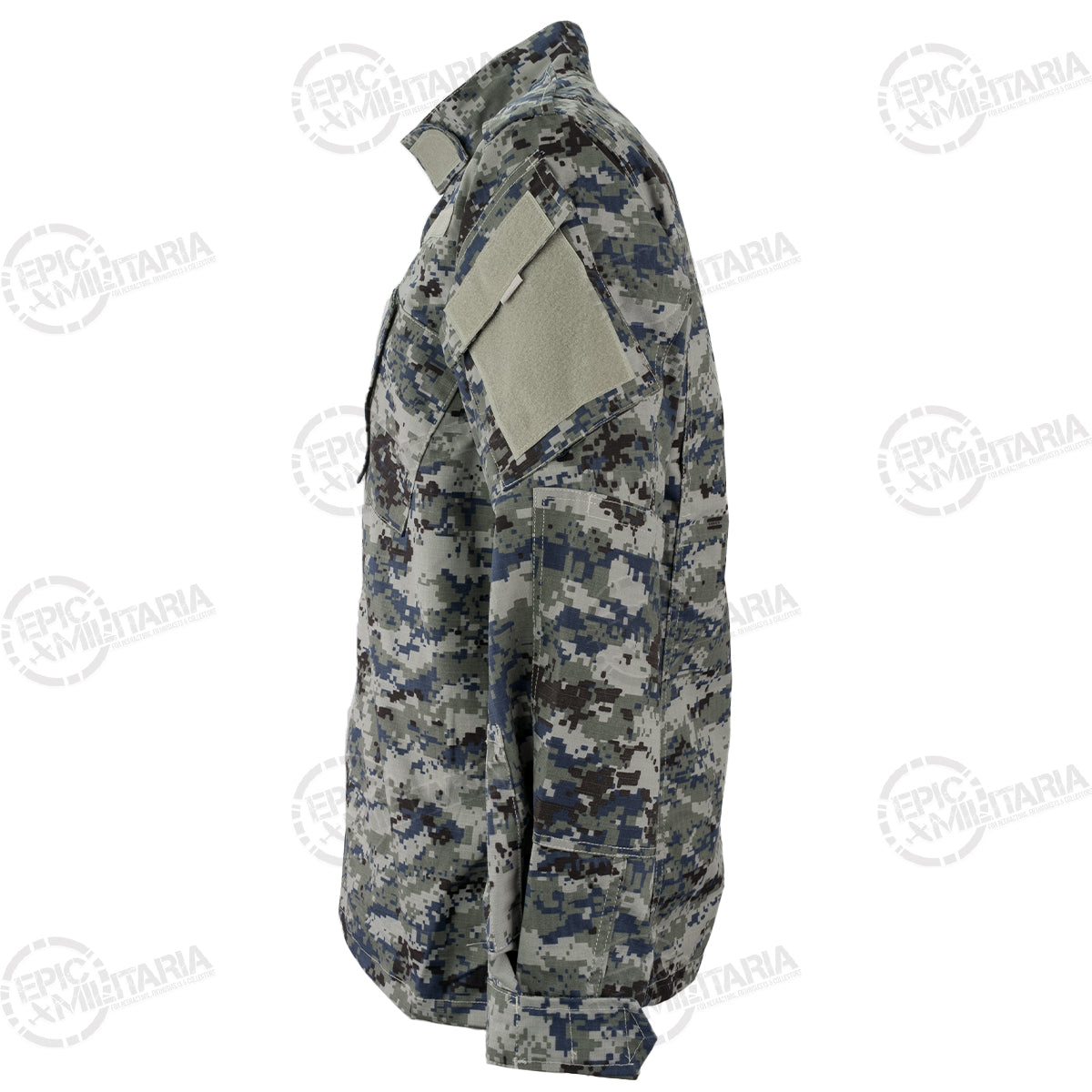 Side profile of an unissued Iraqi Police digital camo shirt showing the sleeve pocket layout and Velcro panels for attaching insignia.