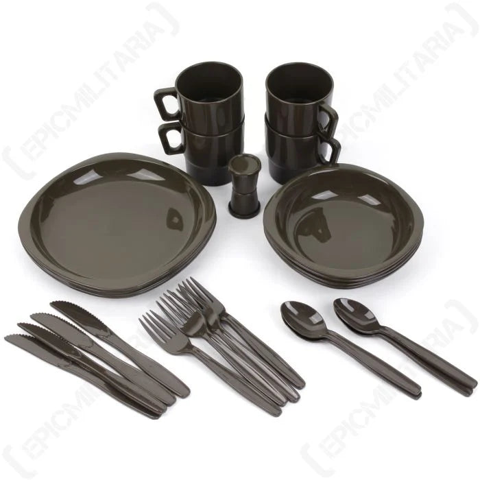 26 piece camping dinner set in olive drab laid out for four people