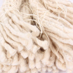 Macro shot of army surplus rifle cleaning strings, capturing the intricate weave and fibrous texture used for effective bore cleaning.