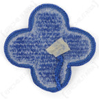 Reverse view of vintage US 88th Infantry Division patch showing white thread embroidery backing