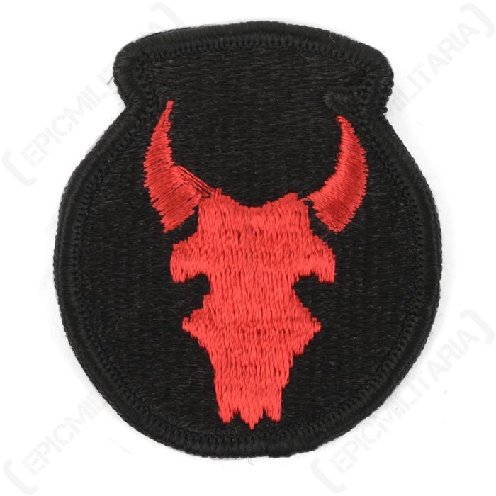 Front view of original US 34th Infantry Division shoulder patch featuring red steer skull on black olla background