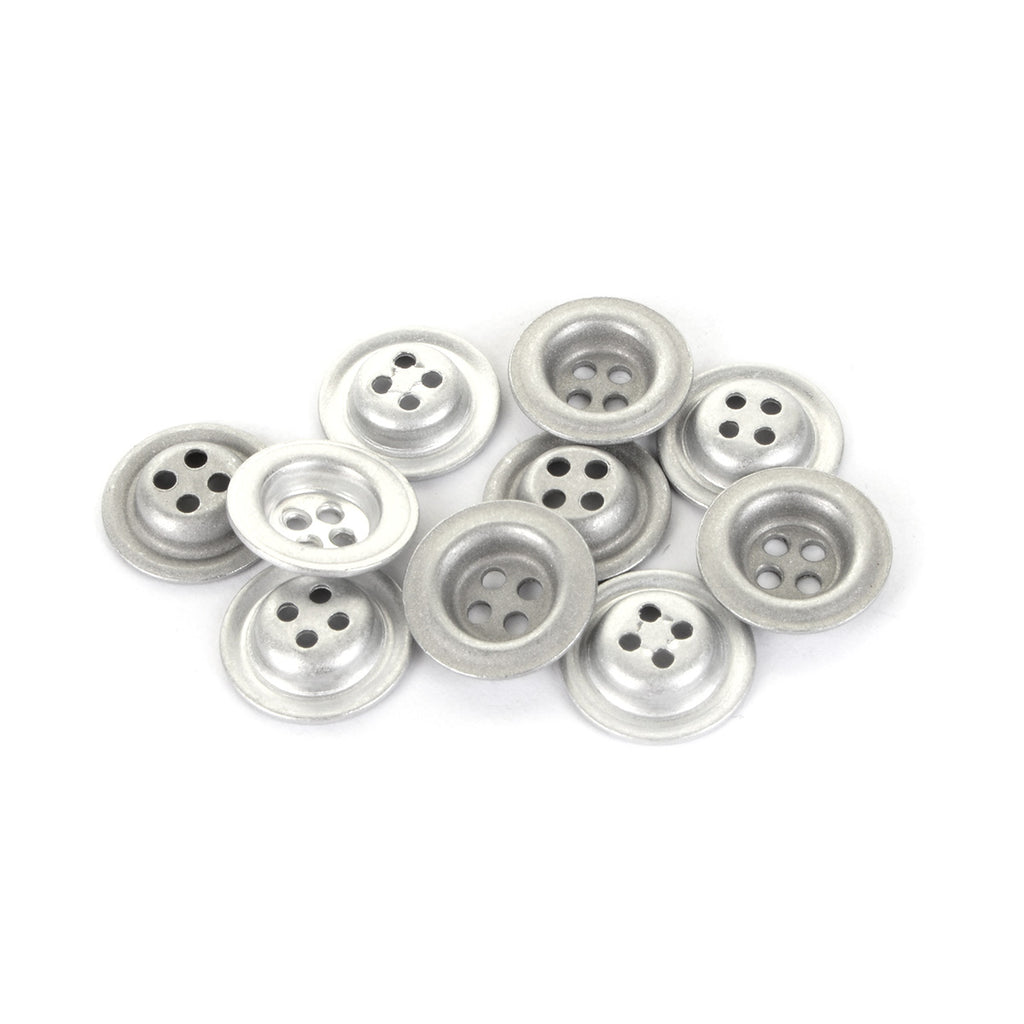 A group of eleven silver-finish metal dish buttons scattered, showcasing the durable German-made 18mm design.