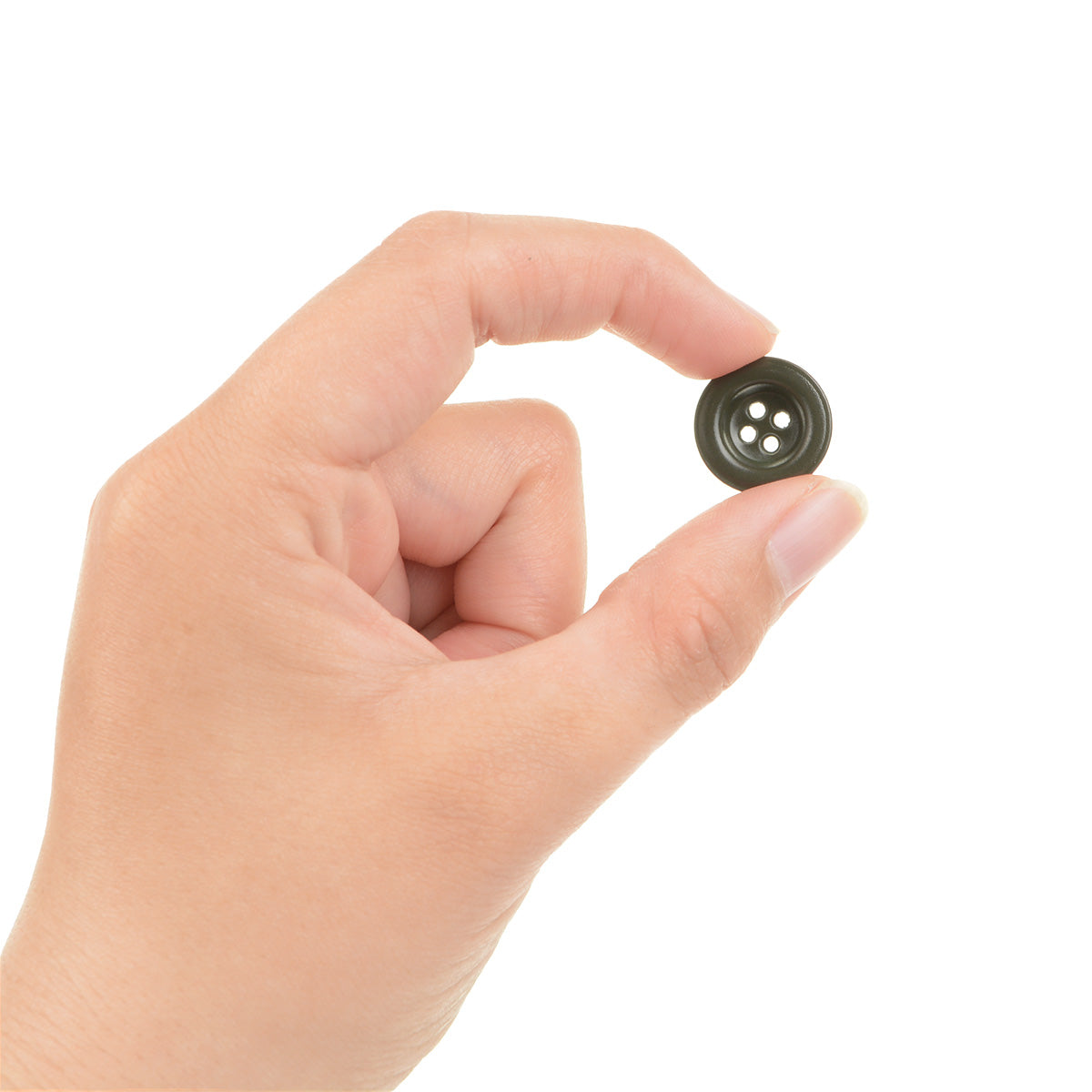 A hand holding a single 18mm field grey German button to demonstrate its small, versatile size for uniform repairs and costume design.