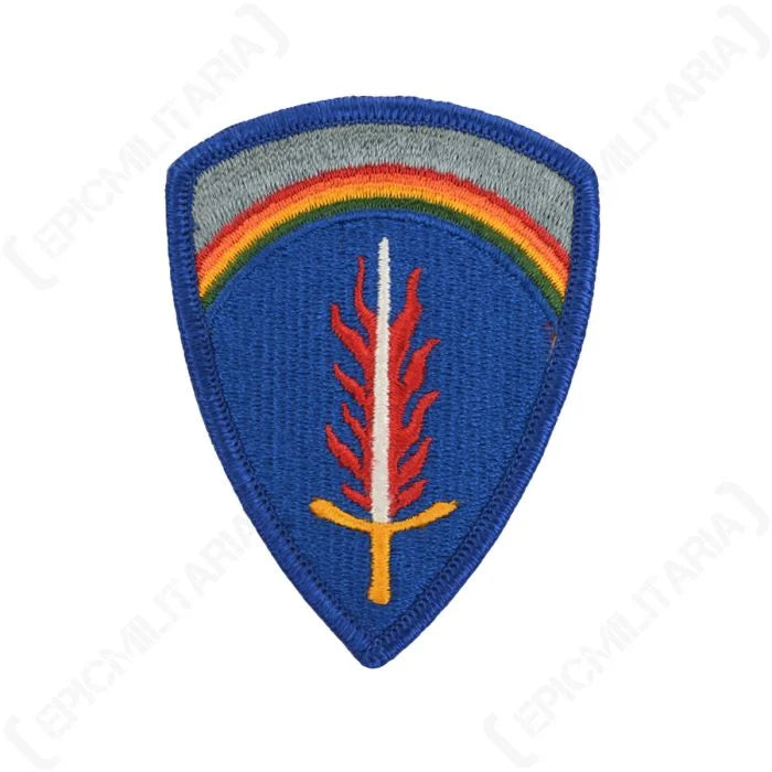 Front view of the embroidered US Army Europe shield patch with flaming sword and rainbow insignia.