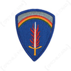 Front view of the embroidered US Army Europe shield patch with flaming sword and rainbow insignia.