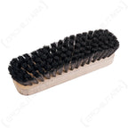 Authentic Bundeswehr military kit clothes brush showing the stiff black bristles designed for removing dirt and debris from uniforms.