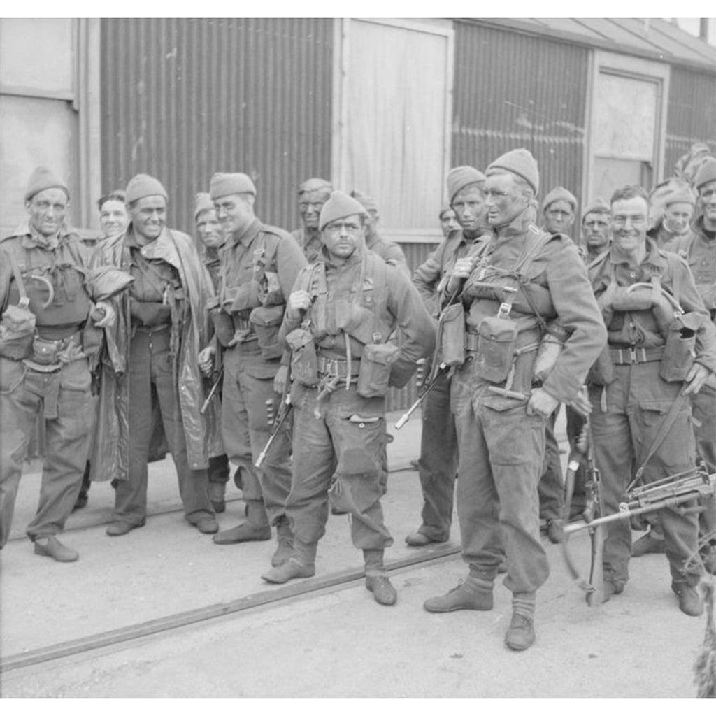 Historical archival footage of British commandos during World War II wearing their iconic woollen cap comforters.