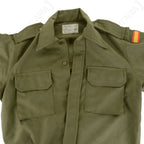 Close-up of the Spanish Army field shirt collar and button placket, showing internal clothing tag details and chest pockets.