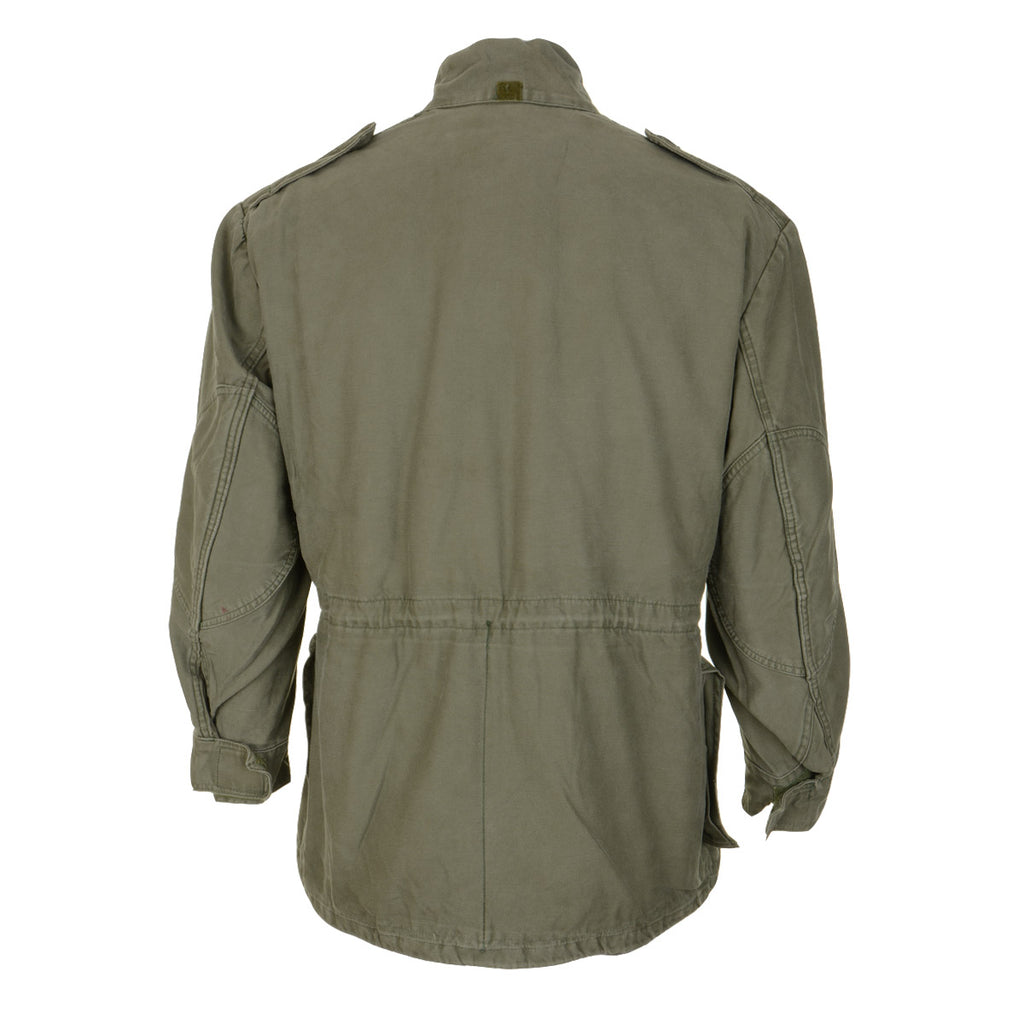 Back view of the vintage Belgian Army M88 field jacket, displaying the robust cotton canvas construction and rear silhouette.