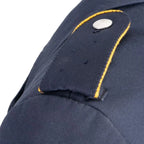 Close-up of Luftwaffe shoulder board with golden yellow piping and silver pebbled button