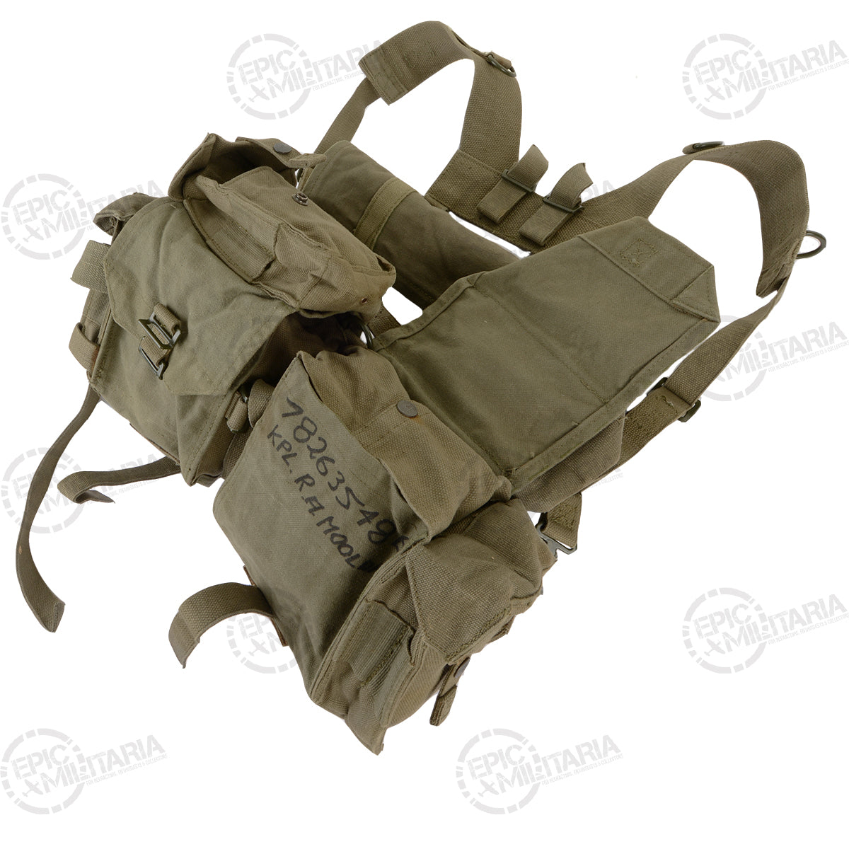 Close-up detail of SADF 70 Pattern webbing pouch featuring authentic hand-inked service numbers and soldier identification for historical character.