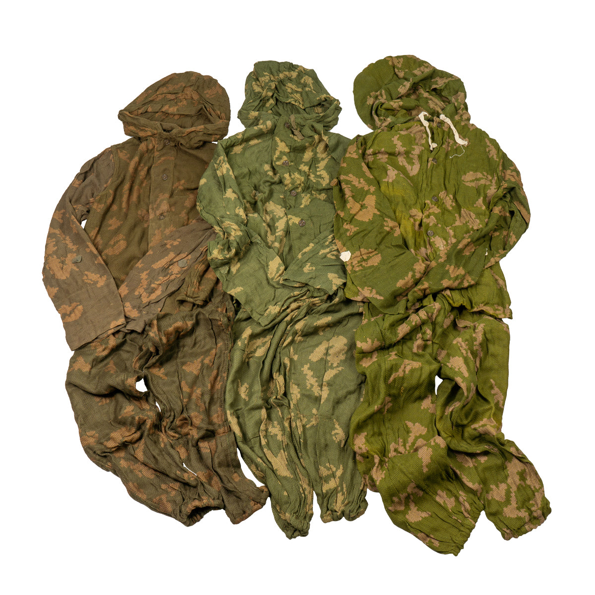 Three different variations of original KZS camo suits arranged together to show pattern consistency.