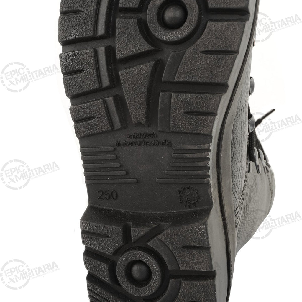 Detailed view of the boot sole markings showing antistatic and oil-resistant properties.