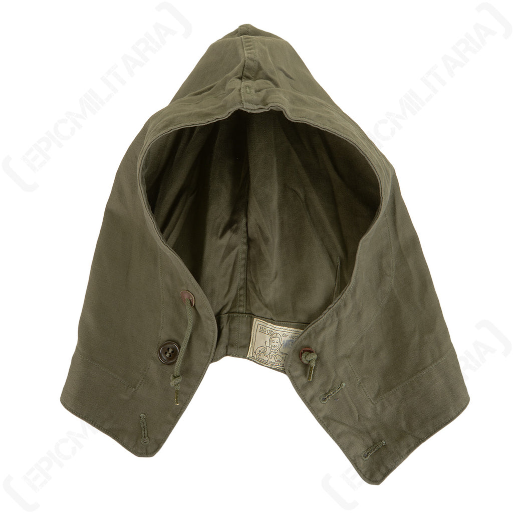 Authentic WWII US Army M43 field jacket hood in olive drab cotton with adjustable drawstring and button attachment points.