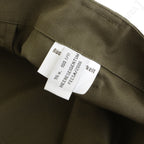 Close-up of the internal clothing label on the Austrian M75 field trousers, verifying military issue authenticity and manufacture details.