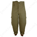 Original Czech M85 army trousers in olive drab featuring a high-waisted design, button fly, and internal ankle cuffs.