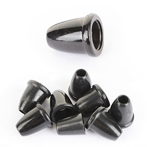 Close-up of a small pile of British Army black cord end stoppers displaying their versatile bell shape for gear maintenance.