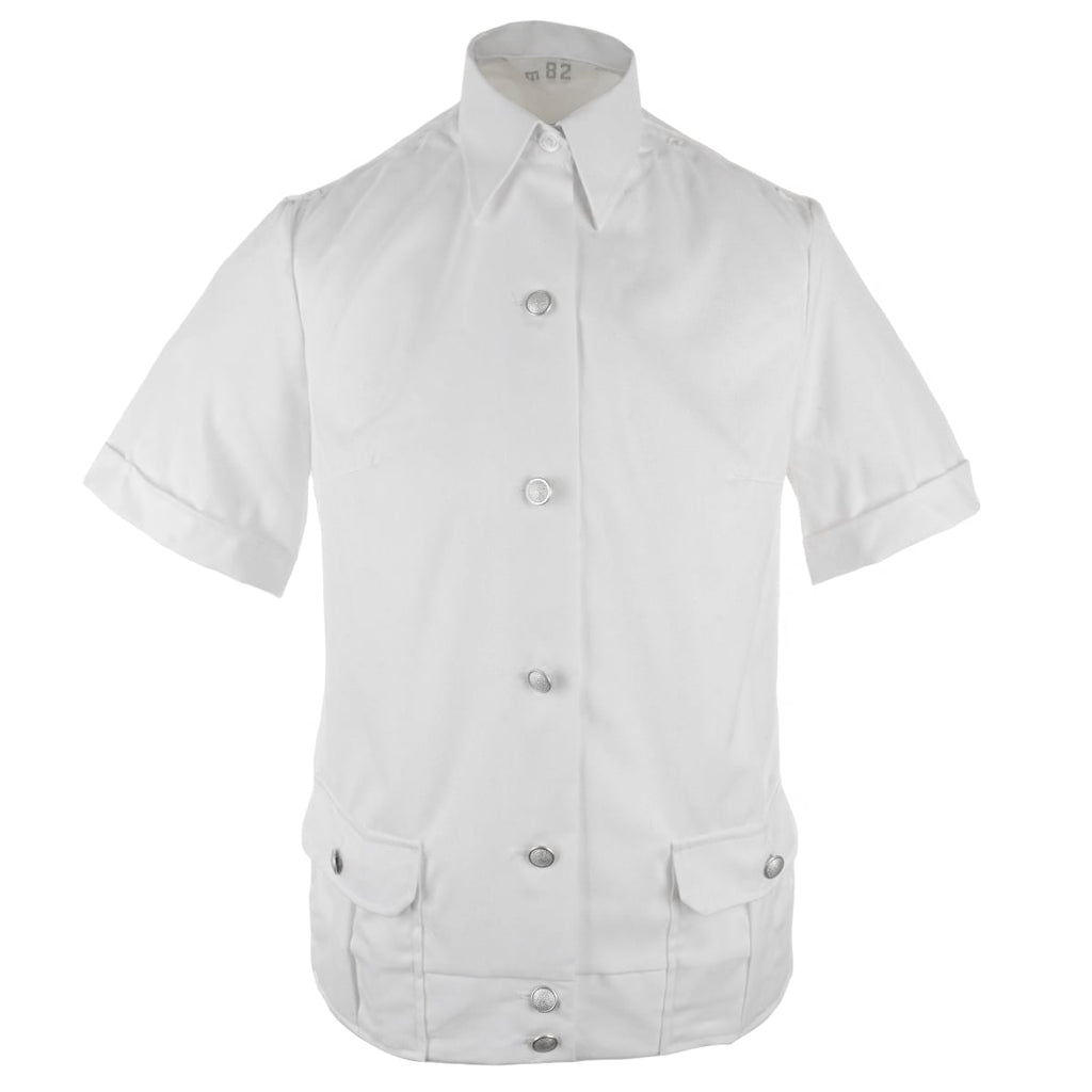 Front view of an unissued white East German police shirt with a buttoned placket, chest pockets, and shoulder epaulettes.